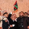 Thủ tướng Libya Ali Zaidan (giữa) phát biểu tại lễ míttinh kỷ niệm 2 năm cuộc biểu tình lật đổ nhà cố lãnh đạoMuammar Gaddafi. (Nguồn: THX/TTXVN)