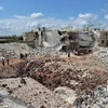 Những ngôi nhà bị phá hủy trong cuộc xung đột tại thị trấn Azaz, miền bắc Syria ngày 21/4. (Nguồn: AFP/TTXVN)