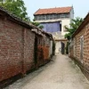 Nhà tầng giữa làng cổ Đường Lâm. (Ảnh: Nhật Anh/TTXVN)