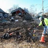 Cảnh tàn phá do bão Sandy tại New Dorp, New York ngày 4/1. (Nguồn: AFP/TTXVN)