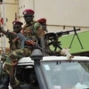 Các tay súng Seleka tới dự cuộc gặp với thủ lĩnh lực lượng nổi dậy Michel Djotodia ở Bangui ngày 30/3. (Nguồn: AFP/TTXVN)