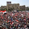 Tuần hành ủng hộ Tổng thống Mohamed Morsi tại quảng trường Al-Adaweya ở Nasr City, Cairo ngày 30/6. (Nguồn: THX/TTXVN)