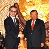 Phó Chủ tịch Bounnhang Vorachit tiếp Bộ trưởng Marty Natalegawa. (Ảnh: Hoàng Chương/Vietnam+)