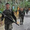 Các tay súng MILF tại căn cứ Darapan ở tỉnh Sultan Kudarat thuộc đảo Mindanao, miền nam Philippines ngày 5/9/2011. (Nguồn: AFP/TTXVN)