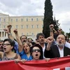 Người biểu tình tham gia cuộc đình công ở Athens ngày 16/7. (Nguồn: AFP/TTXVN)