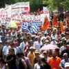 Người biểu tình tham gia cuộc đình công ở Thessaloniki ngày 16/7. (Nguồn: AFP/TTXVN)