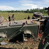Lực lượng an ninh điều tra tại hiện trường một vụ nổ bom ở Pattani. (Nguồn: AFP/TTXVN)