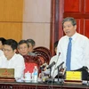 Bộ trưởng Bộ Tài nguyên và Môi trường Nguyễn Minh Quang phát biểu tại phiên họp. (Ảnh: An Đăng/TTXVN)