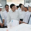 Chủ tịch nước Trương Tấn Sang thăm Nhà máy chế biến Canxi Cacbonat Bắc Kạn. (Ảnh: Nguyễn Khang/TTXVN)