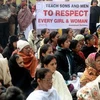 Biểu tình phản đối tình trạng cưỡng hiếp và bạo lực đối với phụ nữ tại Ấn Độ. (Nguồn: AFP/TTXVN)