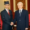 Tổng Bí thư Nguyễn Phú Trọng tiếp Quốc vương Malaysia Abdul Halim Mu’adzam Shah. (Ảnh: Trí Dũng/TTXVN)