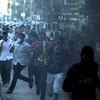 Người biểu tình ủng hộ tổ chức Anh em Hồi giáo và cựu Tổng thống bị lật đổ của Ai Cập Mohamed Morsi trong các cuộc đụng độ với lực lượng an ninh ngày 30/8 ở thủ đô Cairo. (Nguồn: AFP/TTXVN)