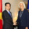 Thủ tướng Nguyễn Tấn Dũng gặp Tổng Giám đốc Điều hành IMF Christine Lagarde. (Ảnh: Đức Tám/TTXVN)