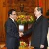 Phó Thủ tướng Nguyễn Thiện Nhân tiếp Chủ tịch Hội Hữu nghị Trung-Việt Tề Kiến Quốc. (Ảnh: An Đăng/TTXVN)