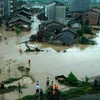 Cảnh ngập lụt do mưa lớn gây ra tại làng Shayuan, tỉnh Giang Tây ngày 20-6. (Nguồn:AFP/TTXVN)