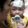 Hàng trăm nghìn trẻ em tại Trung Quốc đã mắc bệnh sau khi dùng phải sữa nhiễm melamine năm 2008. (Nguồn: dawn.com)_