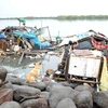 Nhiều khu nhà ổ chuột ở ngoại ô Manila đã bị tàn phá sau khi cơn bão Côn Sơn tràn qua ngày 14/7. (Nguồn: AFP/TTXVN)