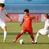 U23 Việt Nam (áo đỏ) đã thua đậm U23 Turkmenistan. (Ảnh: Quốc Khánh/TTXVN)