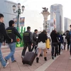 Cảnh sát Macau bắt giữ những đối tượng hoạt động mại dâm ở Venetian. (Nguồn: Trung Sơn/Vietnam+) 