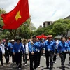 Đoàn đại biểu thanh niên, sinh viên Việt Nam tham gia diễu hành bế mạc. (Nguồn: tienphong.vn)