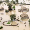 Lũ lụt nhấn chìm nhiều ngôi nhà tại ngoại ô Sukkur, Pakistan hồi tháng 8. (Nguồn: AFP/TTXVN)