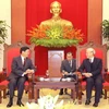 Tổng Bí thư Nguyễn Phú Trọng tiếp Phó Thủ tướng Lào Thoongloun Sisoulith. (Ảnh: Trí Dũng/ TTXVN)