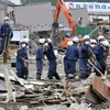 Khắc phục hậu quả động đất và sóng thần tại tỉnh Miyagi ngày 18/6. (Nguồn: AFP/TTXVN)