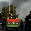 Quân nổi dậy Libya sau các cuộc giao tranh dữ dội ở Tripoli. (Nguồn: AFP/TTXVN)