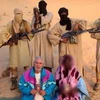 2 con tin người Italy bị nhóm al-Qaeda Bắc Phi bắt cóc hồi đầu năm nay. (Nguồn: Internet)