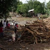 Cảnh tàn phá ở thành phố Iligan, đảo Mindanao ngày 17/12 sau khi cơn bão Washi tràn qua. (Nguồn: AFP/TTXVN)
