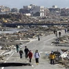 Cảnh đổ nát sau thảm họa sóng thần tại Minamisanriku, Miyagi ngày 14/3. (Nguồn: báo Yomiuri)