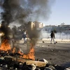 Xung đột giữa người dân Palestine và cảnh sát Israel tại Đông Jerusalem. (Nguồn: AFP/TTXVN)