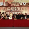 Lễ ký kết hợp đồng mua bán giữa Dalian Wanda Group và AME Entertainment Holdings. (Ảnh: Theoaklandpress.com)
