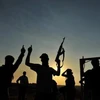 Nhiều tay súng nước ngoài đã tham gia vào hàng ngũ quân nổi dậy Syria. (Nguồn: AFP)