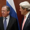 Ngoại trưởng Nga Sergei Lavrov (trái) và người đồng cấp Mỹ John Kerry. (Ảnh: Ria Novosti)