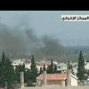 Cảnh đổ nát tại Qusayr sau xung đột ngày 20/5. (Hình ảnh do Đài truyền hình nhà nước Syria cung cấp. Nguồn :AFP/TTXVN)