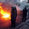 Xung đột giữa cảnh sát và những người biểu tình ở Athens. (Nguồn: AFP/TTXVN)