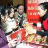 Giới thiệu các sản phẩm nhân sâm Hàn Quốc tại Triển lãm Nhân sâm Hàn Quốc 2012. (Nguồn: TTXVN)