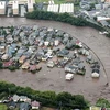Nước lụt nhấn chìm nhiều ngôi nhà ở Kumamoto.(Nguồn: Yomiuri).