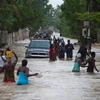 Bão Isaac gây ra cảnh lụt lội ở thủ đô của Haiti. (Nguồn: nydailynews.com).