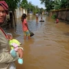 Cảnh ngập lụt ở tỉnh Kandal, cách thủ đô Phnom Penh 20 km về phía đông năm 2011. (Ảnh: AFP/TTXVN)
