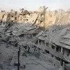Tòa nhà bị phá hủy trong xung đột giữa quân Chính phủ và lực lượng nổi dậy tại thành phố Homs ngày 7/10 vừa qua. (Ảnh: AFP/TTXVN)