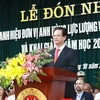 Thủ tướng Nguyễn Tấn Dũng phát biểu tại buổi lễ khai giảng của Học viện Cảnh sát nhân dân (Ảnh: Doãn Tấn/TTXVN).