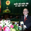 Chủ tịch Quốc hội Nguyễn Sinh Hùng đọc Diễn văn khai mạc kỳ họp. (Ảnh: Nhan Sáng/TTXVN). 