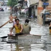 Bão Sơn Tinh gây mưa khiến nhiều khu vực ở Manila, Philippines ngập nặng. (Nguồn: AFP). 