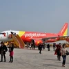 VietJet Air giảm giá vé để phục vụ nhu cầu đi lại ngày càng tăng. (Ảnh: Hoàng Anh Tuấn/Vietnam+).