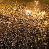 Những người biểu tình phản đối sắc lệnh mới của Tổng thống Morsi ở quảng trường Tahrir ngày 23/11. (Nguồn: THX/TTXVN)