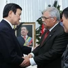 Chủ tịch Trương Tấn Sang chia buồn với Đại sứ Venezuela tại Việt Nam. (Ảnh: Nguyễn Khang/TTXVN)