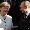 Thủ tướng Đức Angela Merkel và Tổng thống Nga Vladimir Putin tại Hội chợ. (Nguồn: AP)