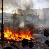 Biểu tình bùng phát thành bạo loạn tại Ai Cập. (Nguồn: AFP)